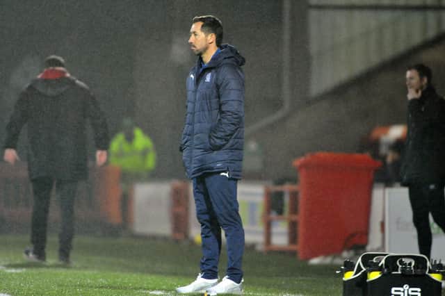 Head coach Martin Rennie on the touchline (Pictures by Michael Gillen, Alan Murray and Scott Louden)