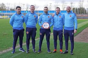 Stenhousemuir boss Stephen Swift pictured with his backroom team after winning the Glen's Manager of the Month award for cinch League 2 (Pic: 3x1 Group)
