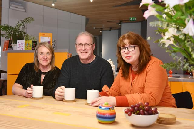 Yvonne McIntosh (right), Maggie's Forth Valley centre head,  alongside Cameron Shanks, who has raised more than £45,000 for the Larbert-based centre, and his wife Claire. Picture: Michael Gillen.