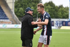 17-08-2024. Picture Michael Gillen. FALKIRK. Falkirk Stadium. Falkirk FC v Heart of Midlothian FC. Season 2024 - 2025. SPFL Premier Sport Cup. Scottish League Cup. Fakirk win  2-0. Falkirk players and staff celebrate at the end of the game. John McGlynn and Coll Donaldson 6.