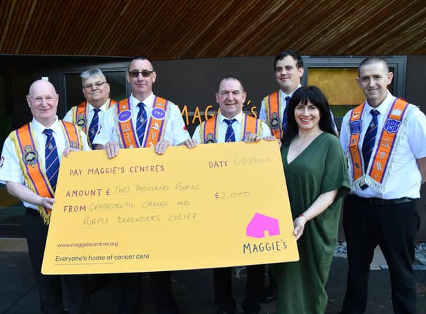 Cheque presentation of £2000 from Grangemouth Orange and Purple Defenders LOL187 for Maggie's Forth Valley.  Pictured: SM Michael Myles; Secretary PM Jim Cummings; Treasurer Ricky Alves; WM John Gibson; DM Alistair Douglas; Cristina Pouso, fundraising manager Maggie's Forth Valley and Ted Pearson member. Pic: Michael Gillen
