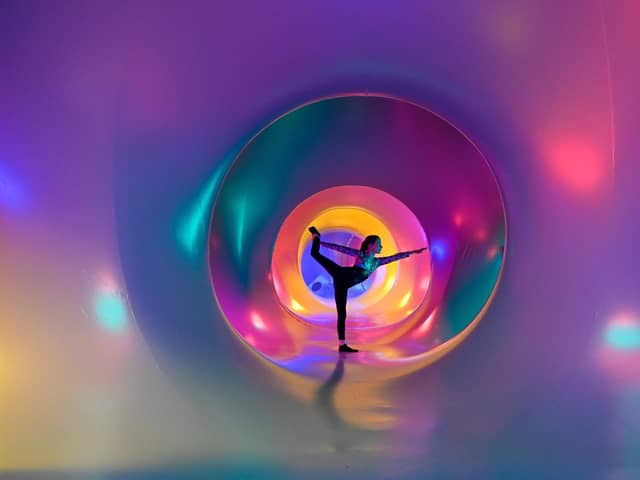 Sophia McMahon, aged 11, enjoys the atmosphere inside the art installation featuring dazzling maze of winding paths and domes. Pic: Julie Howden