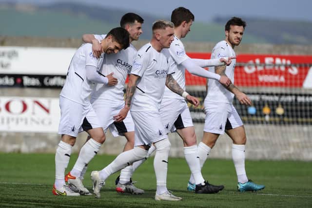 Falkirk players celebrate Telfer's stunning strike that doubled their lead over East Fife