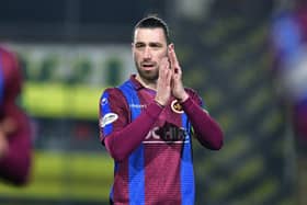 Gregor Buchanan at the end of the game last Saturday - the veteran centre-back has penned a new deal at Stenny (Photo: Michael Gillen)