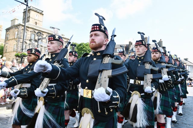 The army marched ahead of the usual procession.