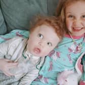 Thea Nisbet, 6, from Bo'ness with her little brother Troy, 2.  Thea has been shortlisted for the Young Sibling of the Year award at the Sense Awards.  (Pic: submitted)