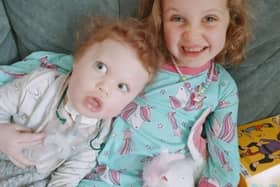 Thea Nisbet, 6, from Bo'ness with her little brother Troy, 2.  Thea has been shortlisted for the Young Sibling of the Year award at the Sense Awards.  (Pic: submitted)