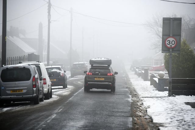 Drivers find a snowy scene in Shieldhill's Main Street