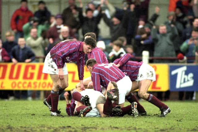 Stenhousemuir striker - and dairy farmer - Tommy Steele sealed a famous win for the Warriors, scoring twice against Roy Aitken’s top-flight Aberdeen (Pictures by SNS Group)