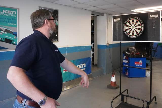 Wade in darts action at local dealership