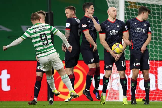 Leigh Griffiths of Celtic has a free-kick blocked by Conor Sammon of Falkirk during their sides' Scottish Cup third-round match in Glasgow today (Photo by Ian MacNicol/Getty Images)