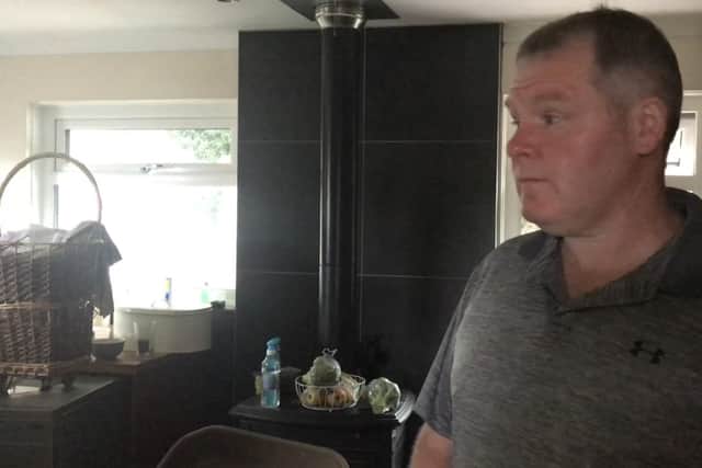 Train driver Martin  Wood's Maddiston home was flooded when the Manuel Burn burst its banks