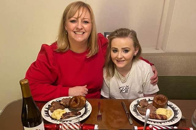 Brightons teenager Ashlee Easton enjoys a Christmas dinner in New York with mum Lisa prior to receiving a third round of treatment for high-risk neuroblastoma. Picture: Ashlee's Neuroblastoma Appeal on Facebook.