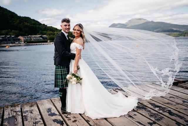 Taekwondo coach Asia Bailey swapped her usual white suit for a beautiful bridal gown for her recent marriage on the bonnie banks of Loch Lomond. Asia, 24, from Falkirk, married long-term partner Josh Macniven, 25, on July 20 at the Lodge at Loch Lomond Hotel. The couple met seven years ago when both were studying sport and fitness at North Lanarkshire College in Cumbernauld. Asia has been involved in taekwondo since a young age through her dad David Bailey’s Central Academy and competed across the world with Team GB between the ages of 16 and 18. Pic: Megan Brown Photography