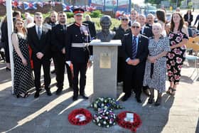 Family, friends and Lord Lieutenant Alan Simpson attended Laurieston Cross last year for the official unveiling of a memorial in honour of Laurieston SAS soldier John McAleese. Picture Michael Gillen.