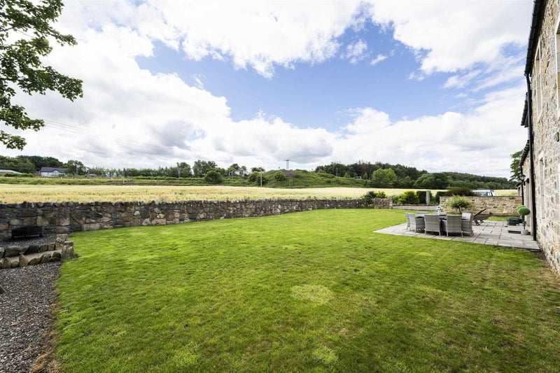 The garden is largely laid to lawn and offers fantastic countryside views.