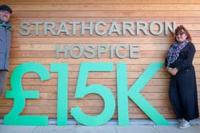 ScottishPower's Lorne McCulloch gives Strathcarron Hospice's Jackie Johnson the good news about the £15,000 donation
(Picture: Submitted)