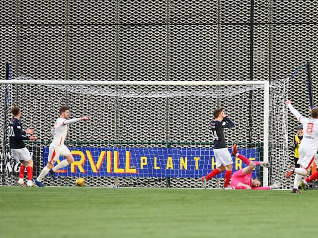 Jamieson celebrates scoring the equaliser (Pictures by Michael Gillen)
