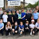 St Joseph's and Antonine Primary schools join together to campaign against dog fouling. Pic Michael Gillen