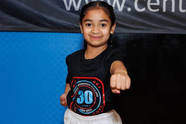 Six-year-old Raheema Haja shows off her taekwondo moves