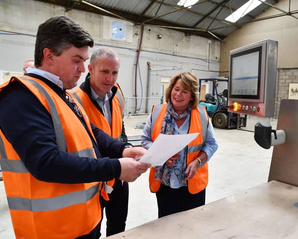 MSPs Michael Matheson and Michelle Thomson hear about the work of Newton Steel Frames from MD Richard Webb