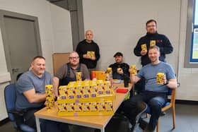 Grangemouth dockers with just some of the 300 chocolate eggs they donated to the Inchyra park Easter Egg Hunt event
(Picture: Submitted)