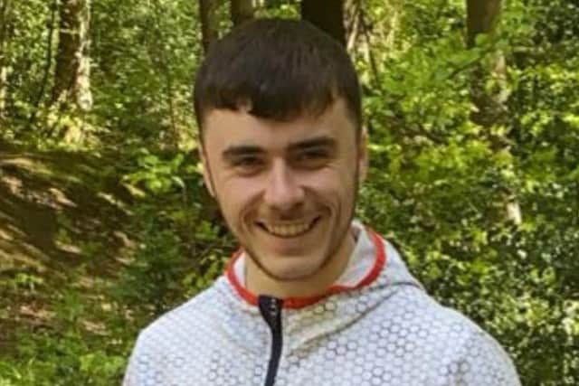 Police Scotland has confirmed the pedestrian who died following the incident was Sean McGinley, 24, and flowers have been laid near the scene of the road traffic collision paying tribute to him