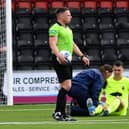 PJ Morrison receives treatment after injury at Airdrieonians in August