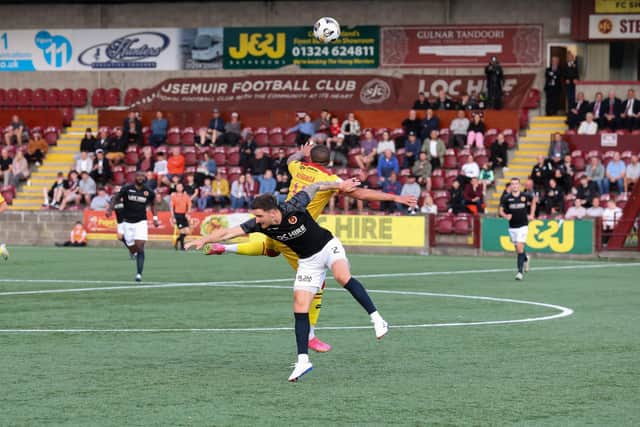 Stenhousemuir's Ross Meechan and Ayr United's Frankie Musonda vying for the ball on Tuesday (Pic: Mark Ferguson)