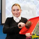 A proud youngster prepares to Address the Haggis.