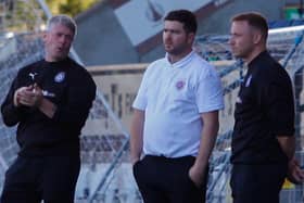 Gordon Herd and his backroom staff have completed the loan signing of Dan Baur