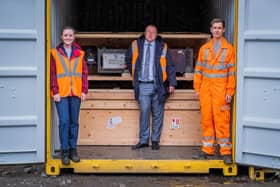Transport Minister Dey (centre) and hydrogen train team members Emma Armstrong, Scotrail, (L) and Calum Sellar, Arcola Energy (R)