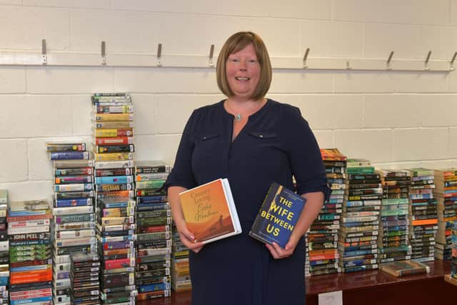 Lisa Duncan is running a community library service during the coronavirus lockdown in conjunction with Stenhousemuir FC's community help hotline. Picture: Michael Gillen.