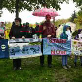 Pilgrimage for COP26 gather at the Peace Pole in Helix Park with some local groups.