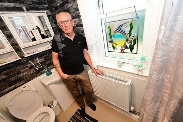 Trevor Ivison from Letham was the first tenant in the village to be connected to the new gas supply. Pic: Falkirk Council