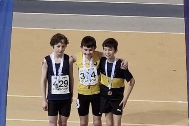 Ben Upfold, right, won bronze at the 800m under-13 level (Photo: Contributed)