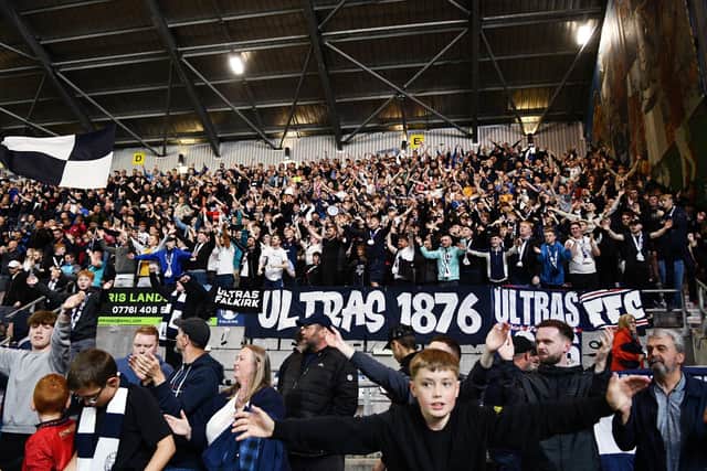 Falkirk fans in the Kevin McAllister Stand celebrate after the 2-1 win against Queen's Park (Photo: Michael Gillen)