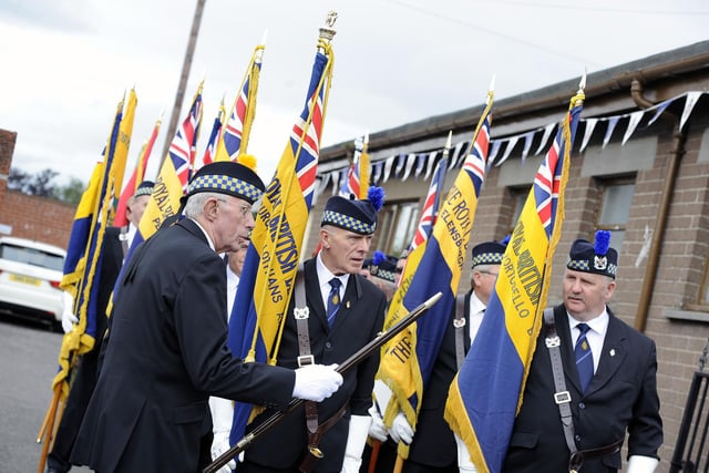 Standard bearers forming up for the parade.