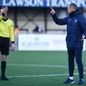 Kenny Miller sent off at the end of the game by referee Colin Steven. (Picture Michael Gillen)