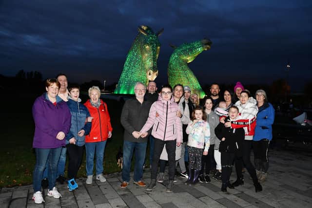 Kelpies turn green for International Phelan-McDermid Syndrome Awareness Day and members of the local branch PMSF branch come along to see them
