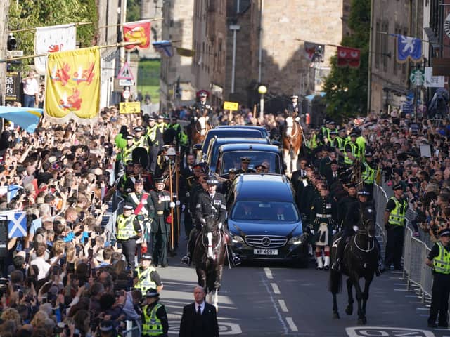 King Charles III and members of the royal family join the procession of Queen Elizabeth's coffin from the Palace of Holyroodhouse to St Giles' Cathedral, Edinburgh.Picture date: Monday September 12, 2022.