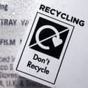 A 'Don't Recycle' label on plastic packaging.