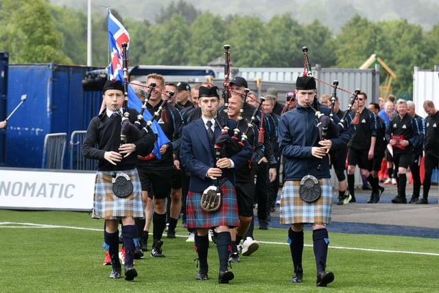 Pipers lead the players into the Falkirk Stadium’s pitch before the Lava Cup got underway last Saturday afternoon