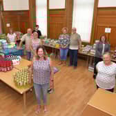 Sheona McMorran (front, centre) and fellow KLSB Community Pantry volunteers are delighted with the support they have received from Stenhousemuir FC. Picture: Michael Gillen.