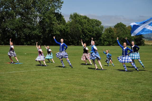 Flags were flown and dancers performed a highland fling in North Green Park to mark the start of 150th year of Airth Highland Games on Saturday. Picture: Michael Gillen.