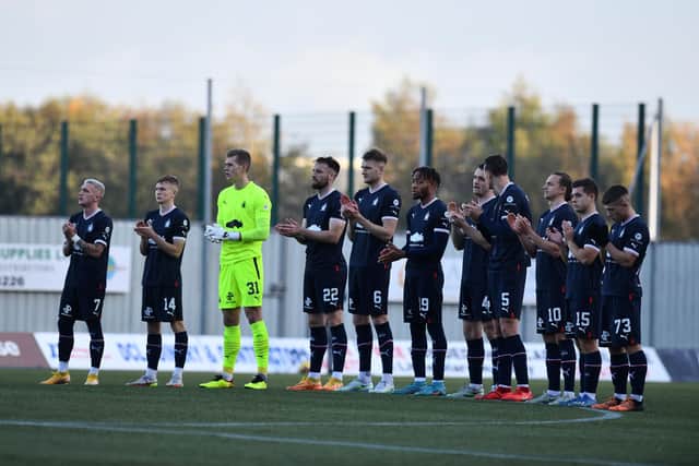 A minute's applause was held in memory of Gordon McFarlane