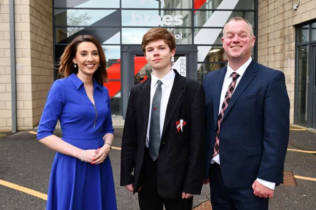 Dux Alexander Ohlstenius with guest speaker Courtney Cameron, a former Braes pupil who is an STV presenter and headteacher Iain Livingstone.  (Pic: Michael Gillen)
