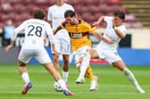 Falkirk debutant Finley Barbrook looks to nick the ball from Motherwell midfielder Lukas Fadinger (Photo: Ewan Bootman/SNS Group)