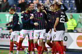 Aidan Keena takes the plaudits after heading Falkirk into the lead on Saturday. Pic by Michael Gillen