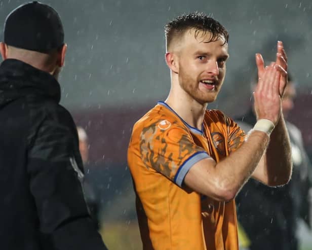 Tony Coutts applauds Shire fans after scoring winner against Celtic B